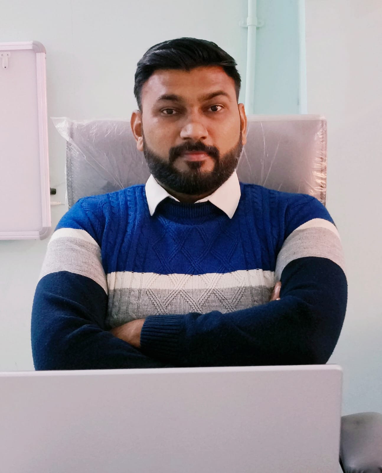 Dr. Chandresh Zinzala, Spine-X Chiropractic Clinic