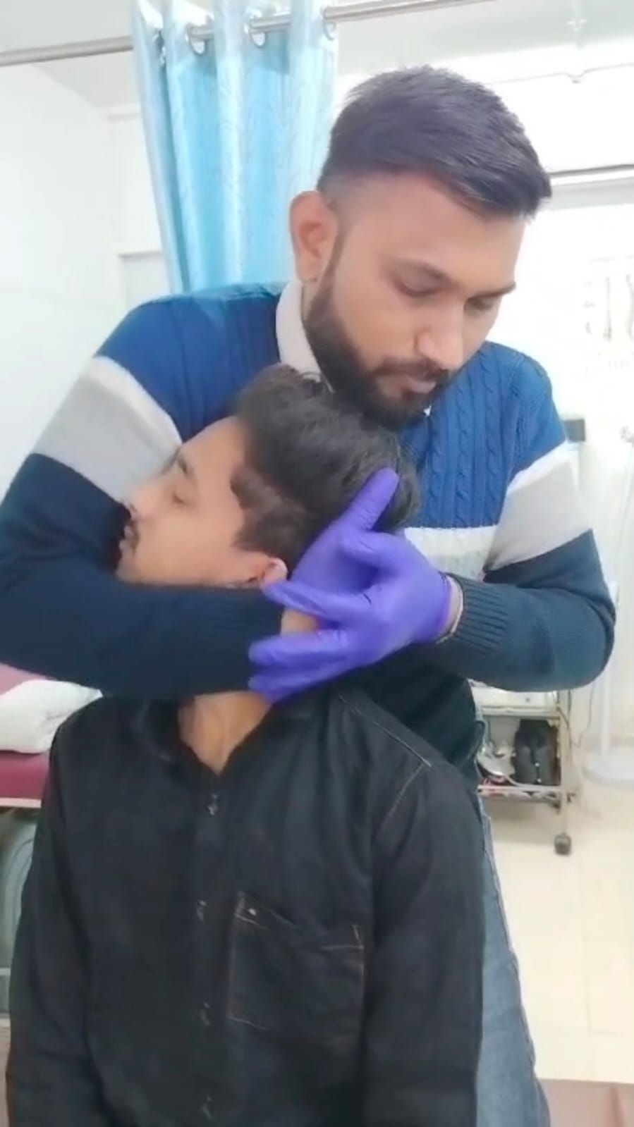 Patient receiving spinal adjustment therapy at Spine-X Chiropractic